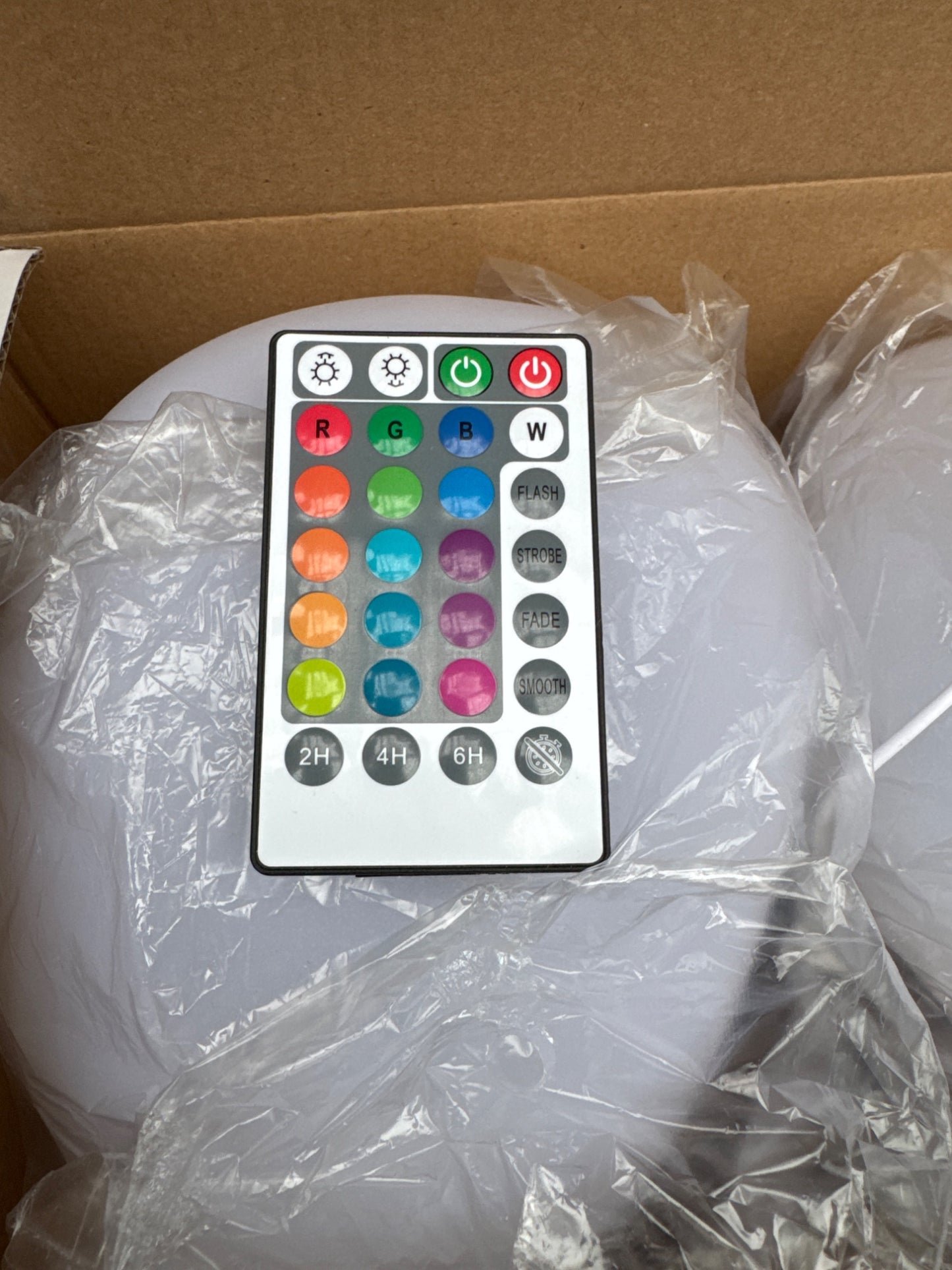 OMT Solar Powered LED Glowing Garden Stones 4 Pack Remote Control Colours